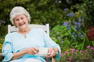 woman enjoying tea on patio