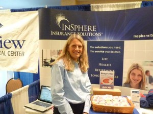 Karen Vachon of Insphere Insurance staffs her booth at the Southern Maine Senior Expo